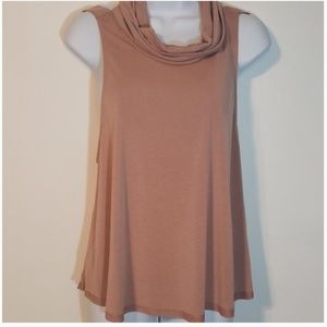 Sage tank top with sagging turtleneck.